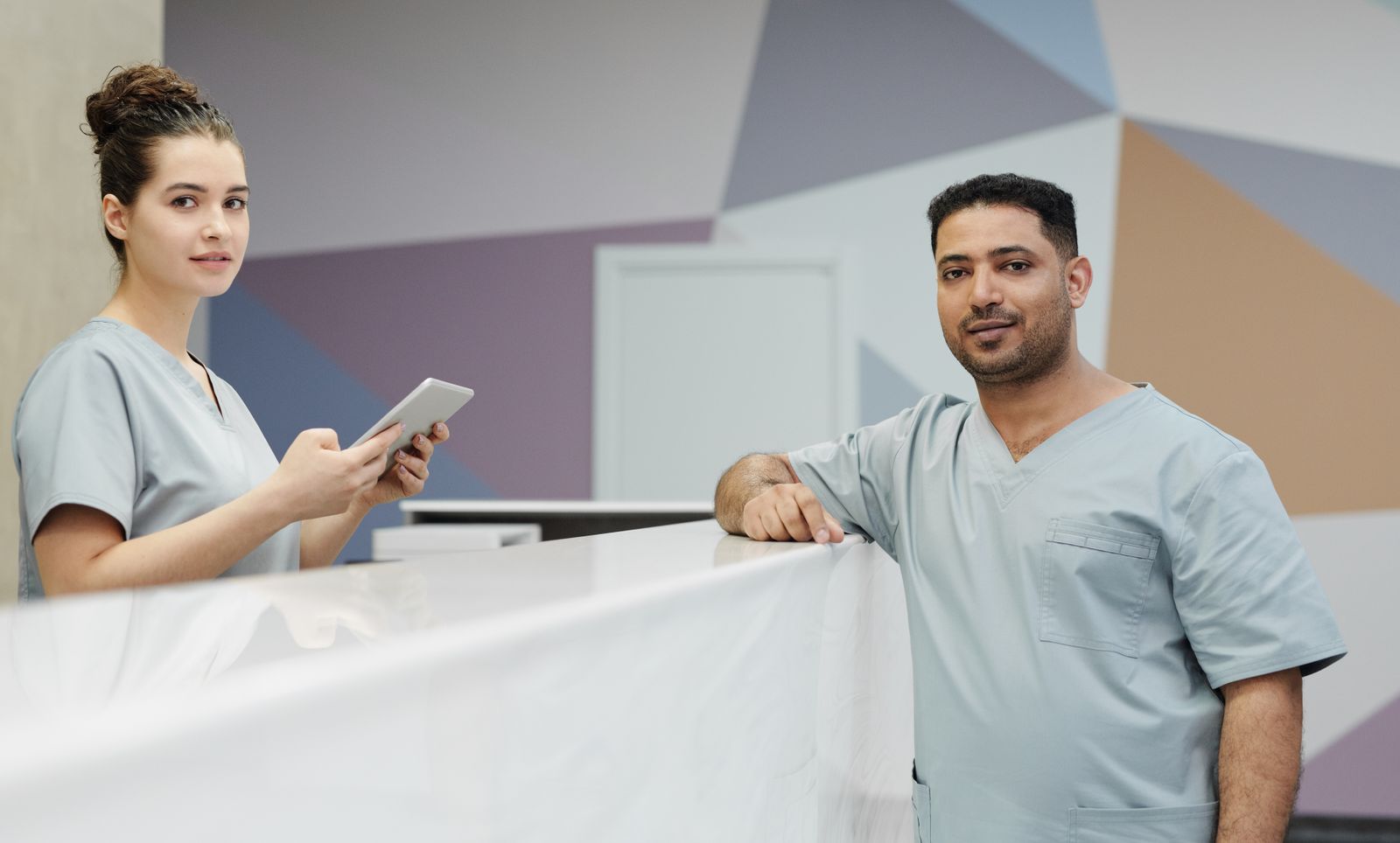 Front desk team welcoming a patient