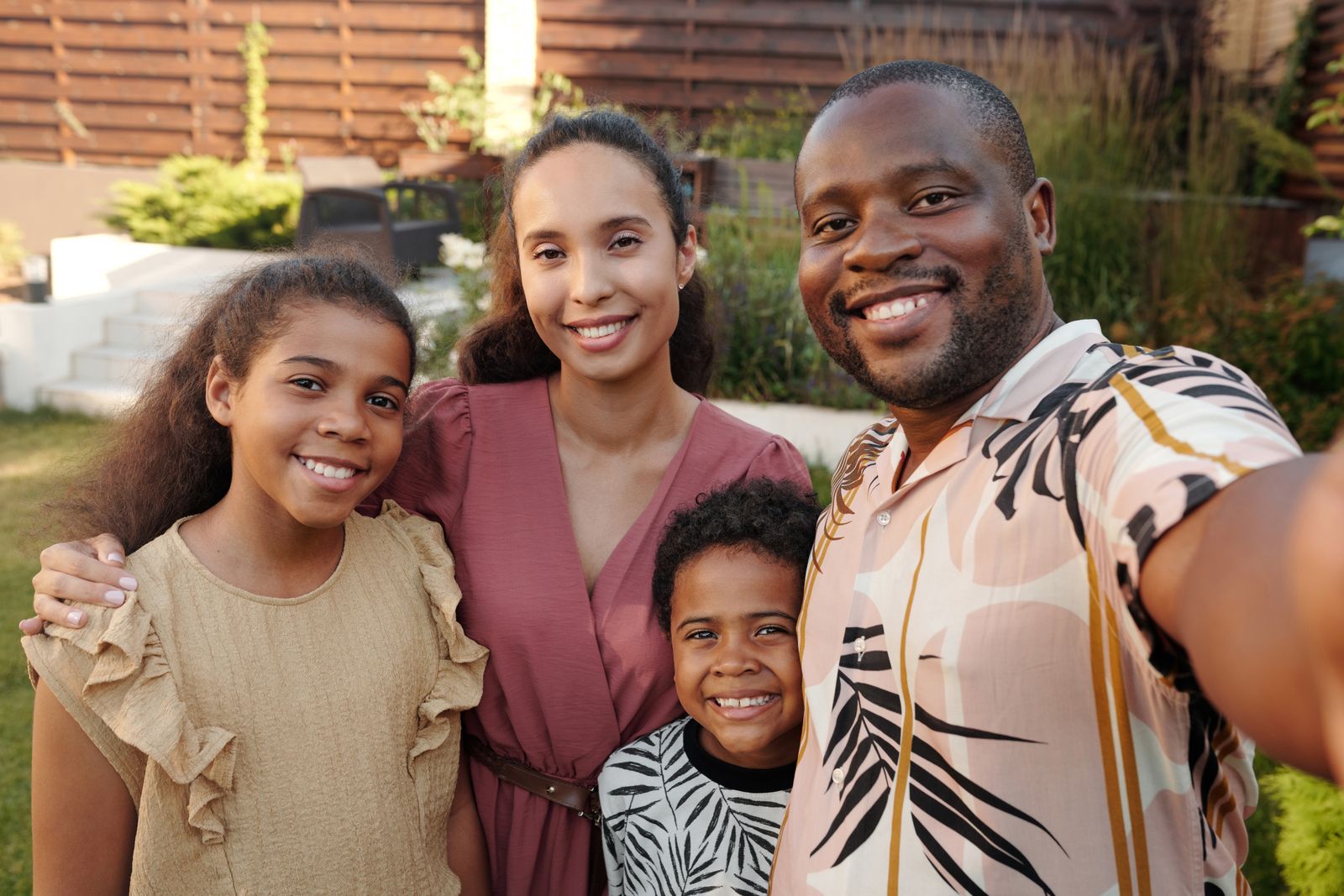 Smiling family together outdoors